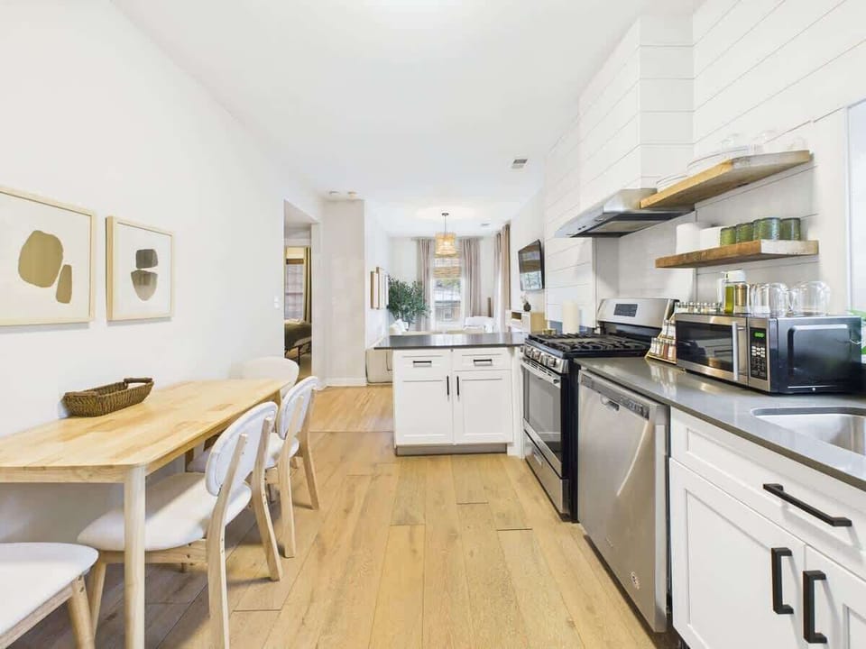 Kitchen: Sleek modern appliances and ample counter space for culinary adventures await!