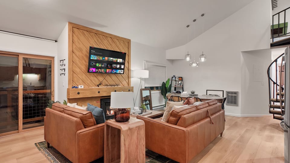 Cozy living room with fireplace and TV