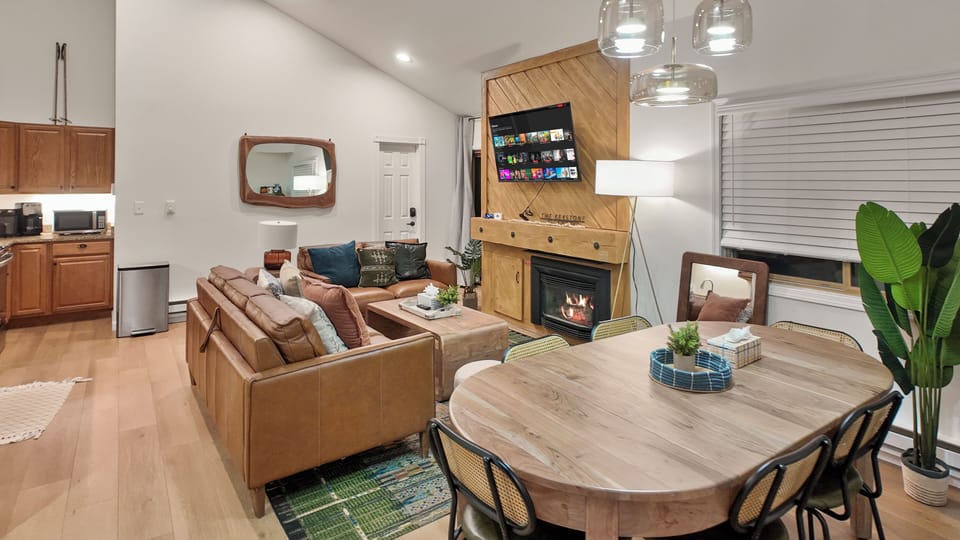 Cozy dining area beside fireplace
