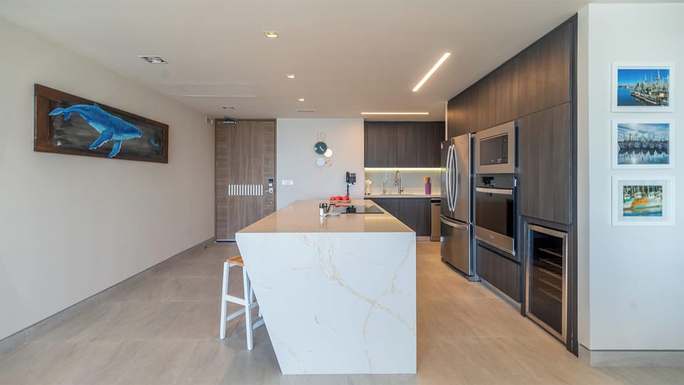 The kitchen offers a lot of room to cook!