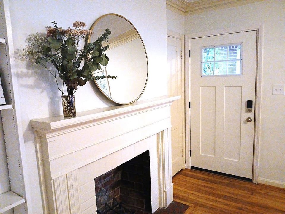Mantel with dried flower arrangement