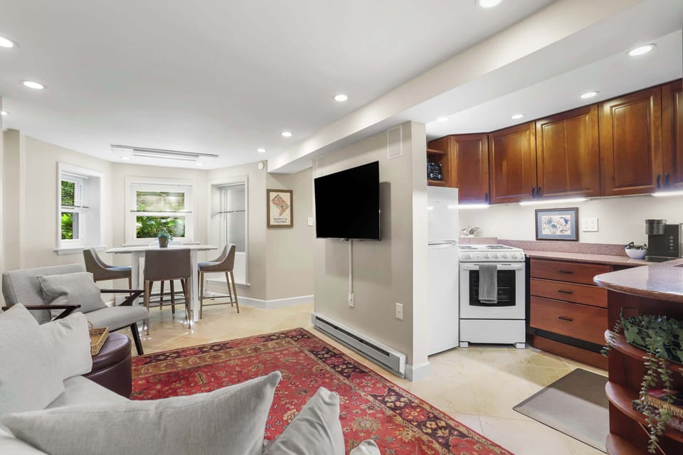 View of living room, dining area and kitchen