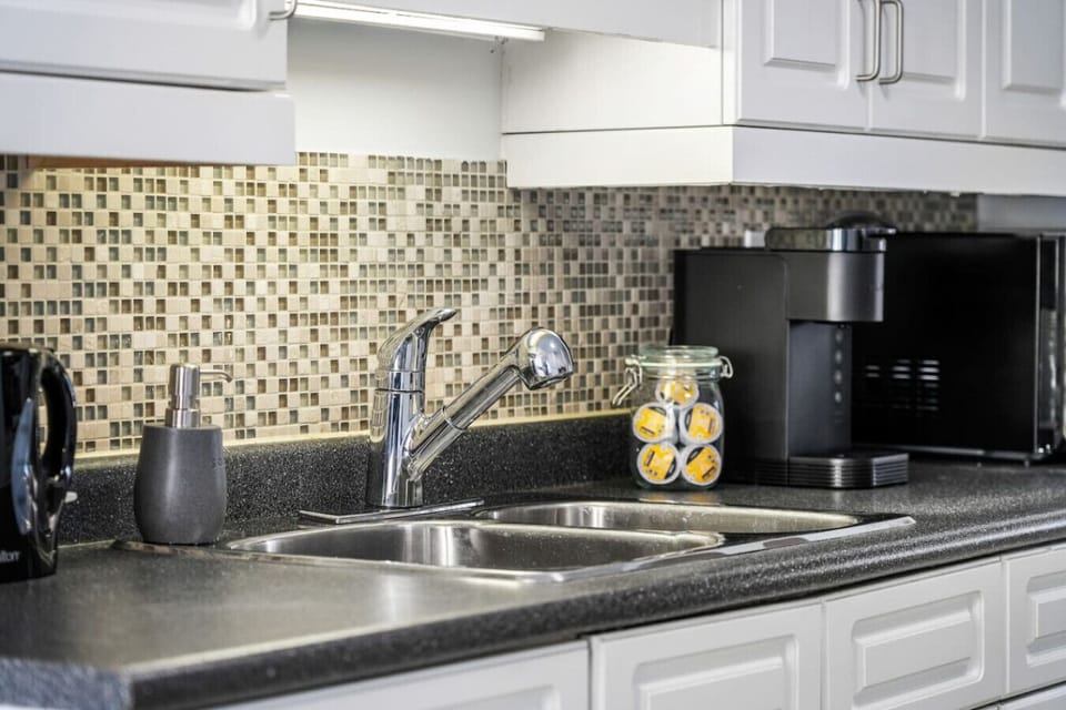 Complimentary coffee pods, tea bags and water. Eletric kettle is available to heat water!