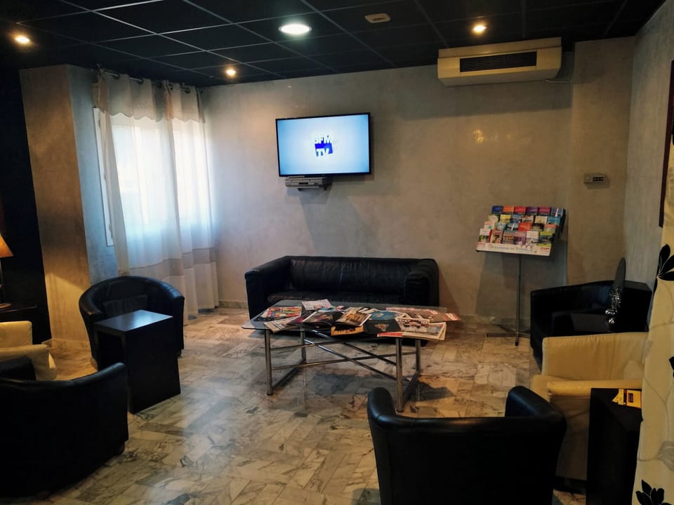 Settle in with a drink and relax in the cozy lounge