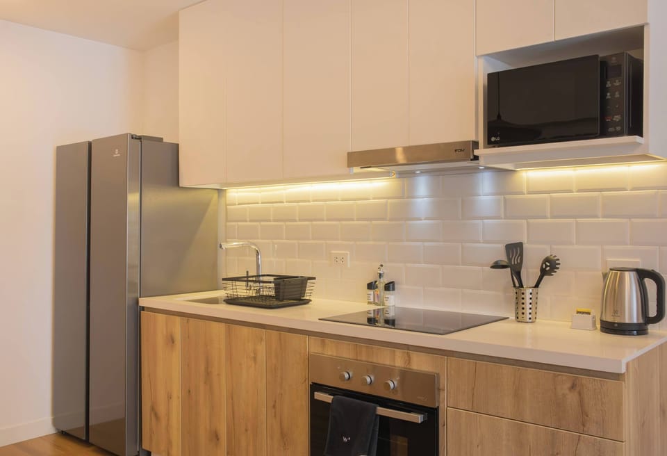 Well-equipped kitchen countertop.