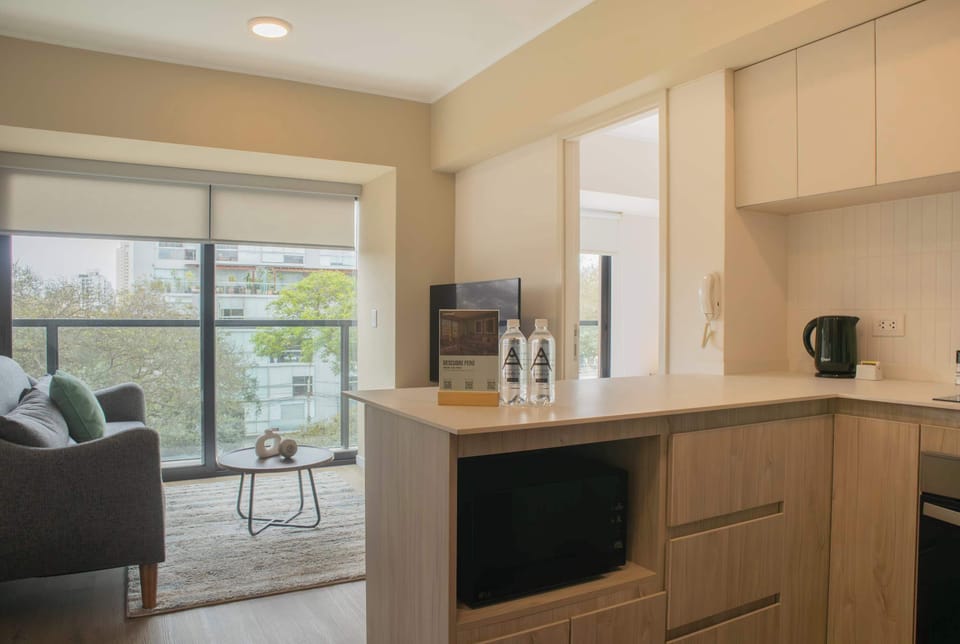 Kitchen and living area with a view.