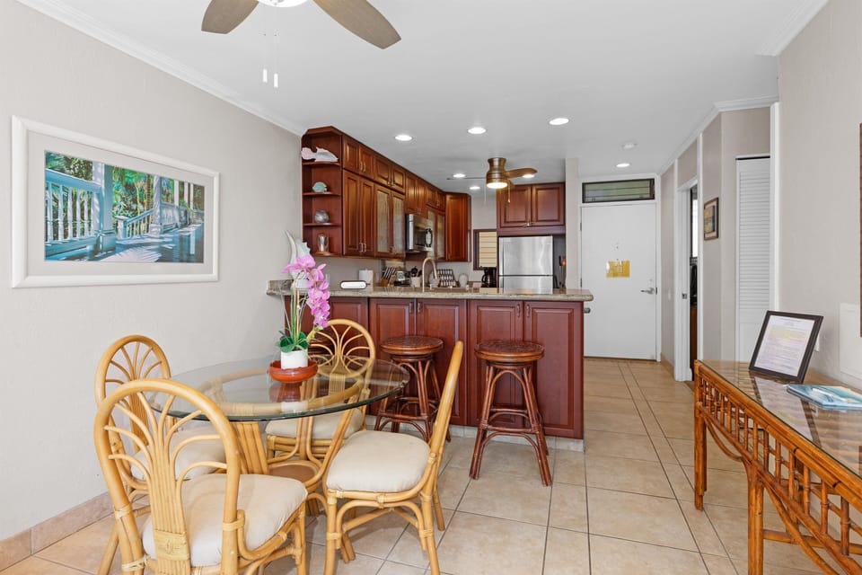 View of the living room, kitchen and the front door from, the lanai