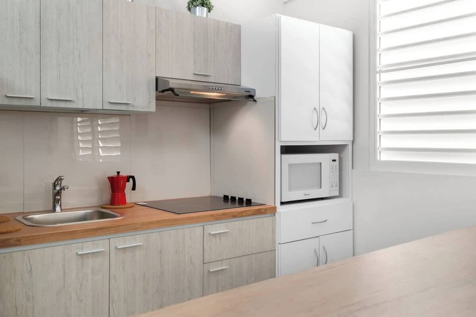 Open design. Kitchen meets living area for easy entertaining.	