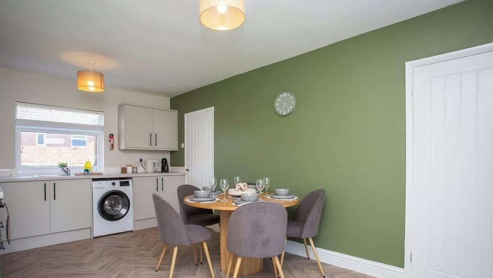 Spacious open-plan kitchen and dining area perfect for shared meals.