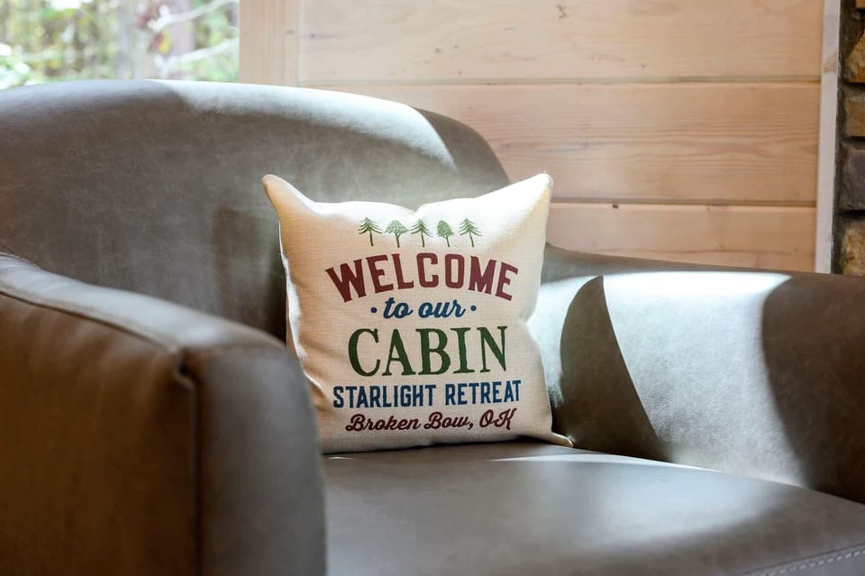 Bight open living area with Smart TV, electric fireplace, and leather seating