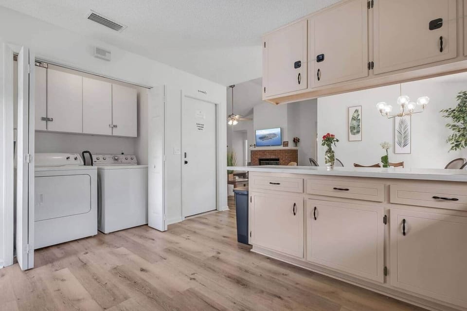 Laundry closet is located in the kitchen in its own closet.  Laundry soap is provided for guest use.