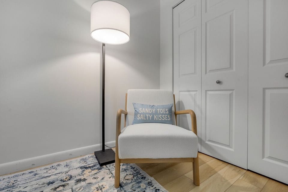 Inviting corner with chair and décor that reflects the serene lake lifestyle.