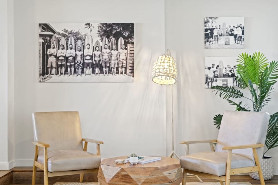 Stylish conversation corner with modern accents and soft lighting for evening relaxation.