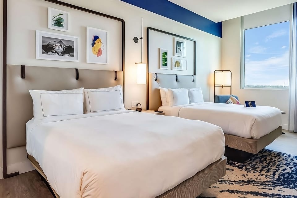 Enjoy extra space for friends with bright, modern double beds.