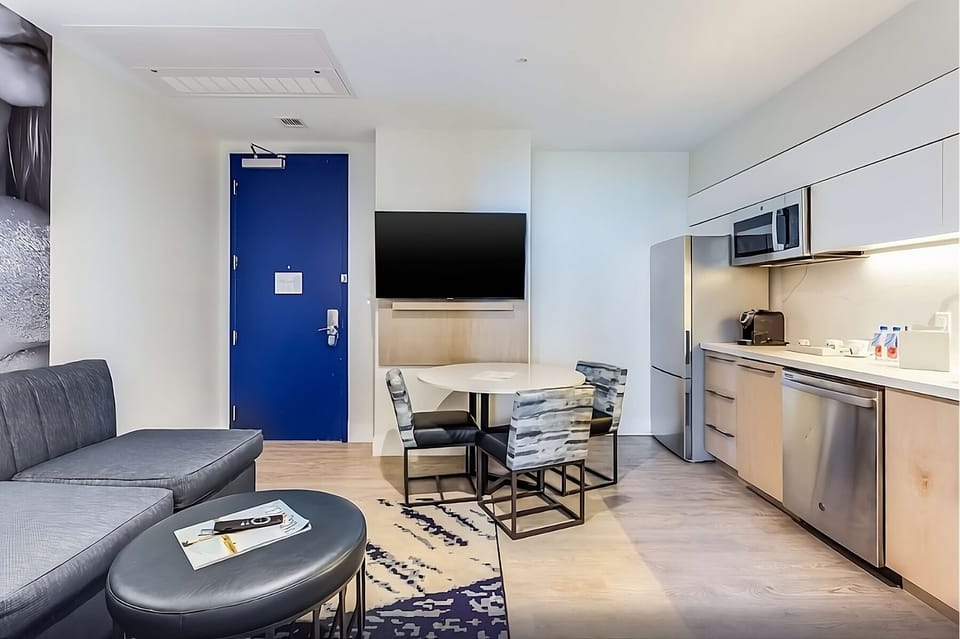 Gather for snacks and movies in your open-plan suite.
