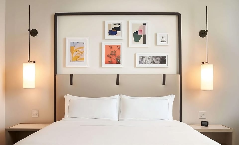Settle into a serene sleep with warm, glowing bedside lights.