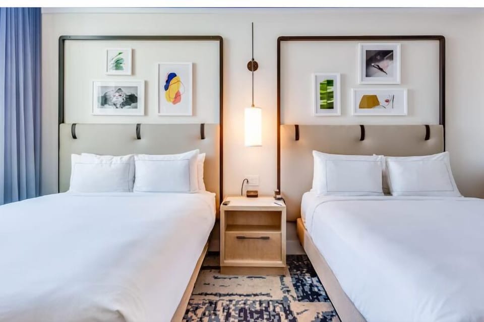 Spread out comfortably with two plush beds and soothing lighting.