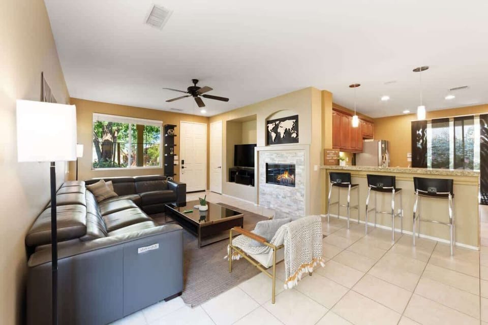 Open living space with kitchen bar seating