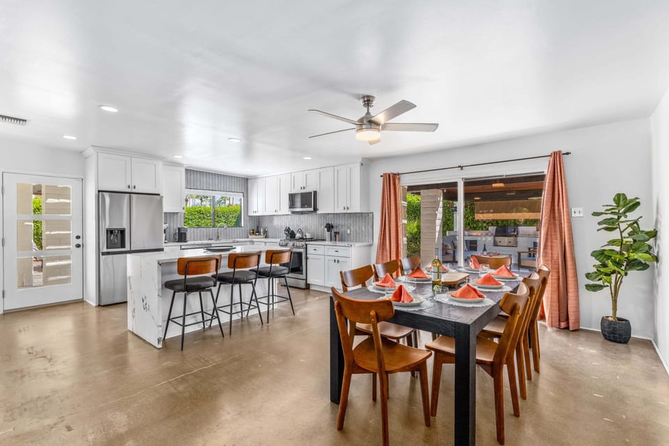 Open concept living, dining and kitchen areas