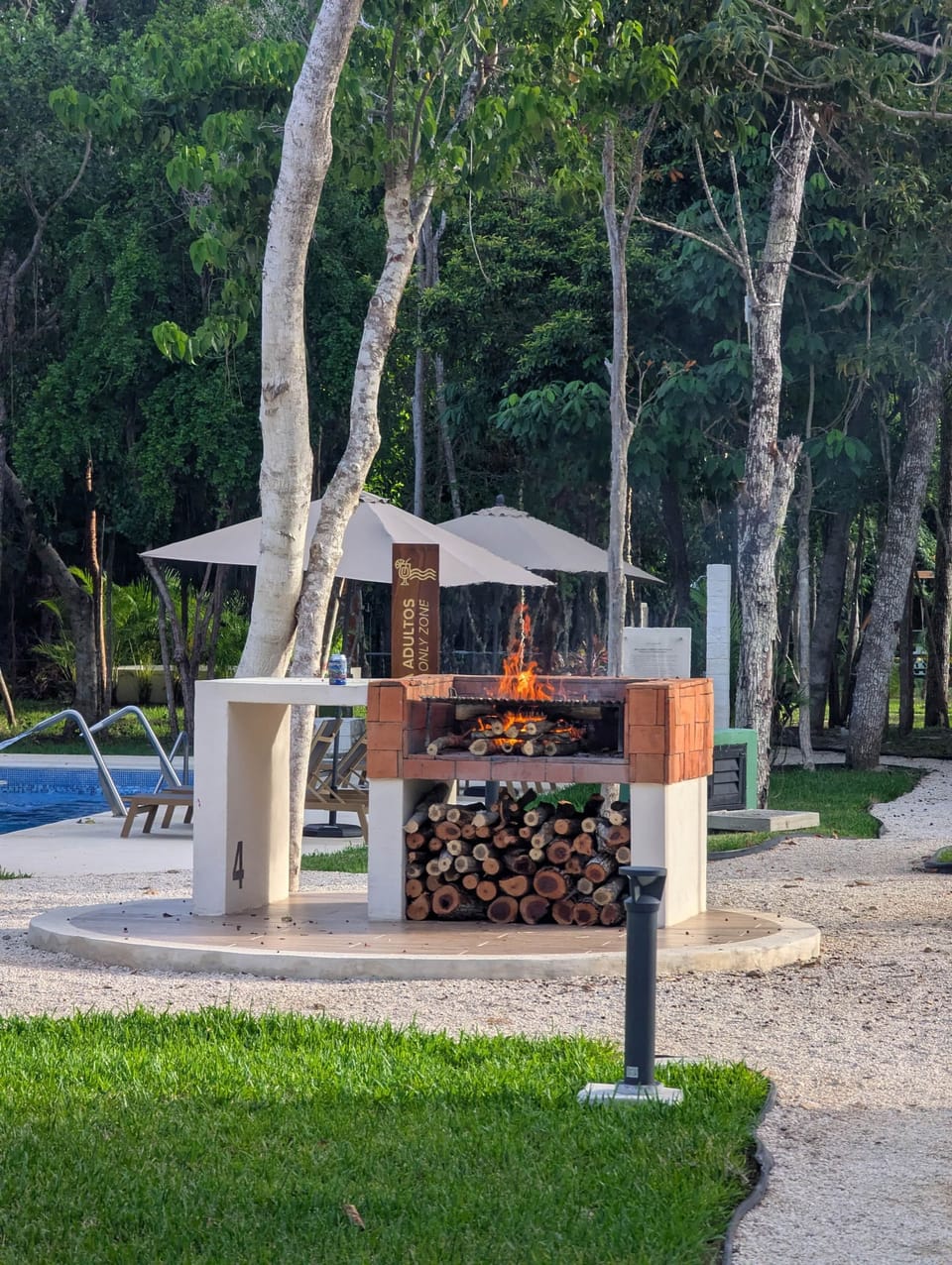 a community outdoor grill and gathering space