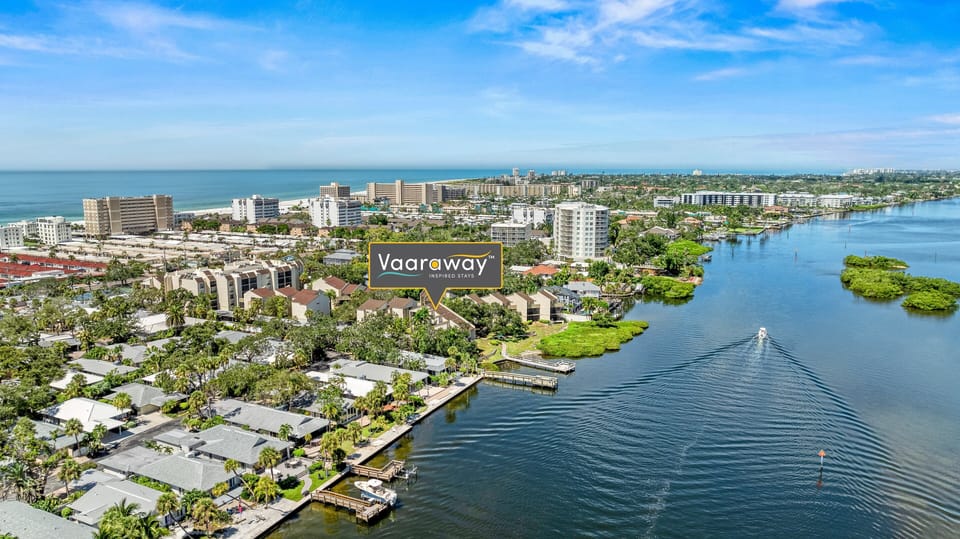 A boat glides through the calm Intracoastal waters, just beyond—welcome to life on the water.