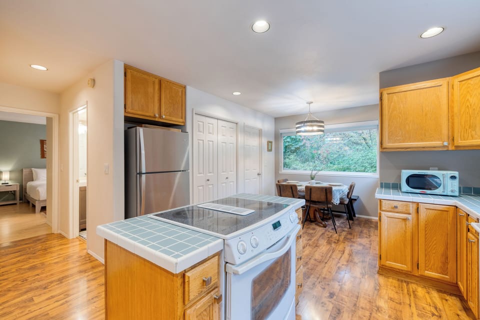 Whip up some culinary delights in your fully stocked kitchen.
