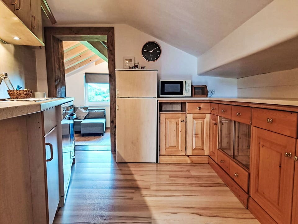 Kitchen, Furniture, Major Appliance, Wood, Countertop, Kitchen Appliance, Flooring, Cabinetry, Interior Design, Floor