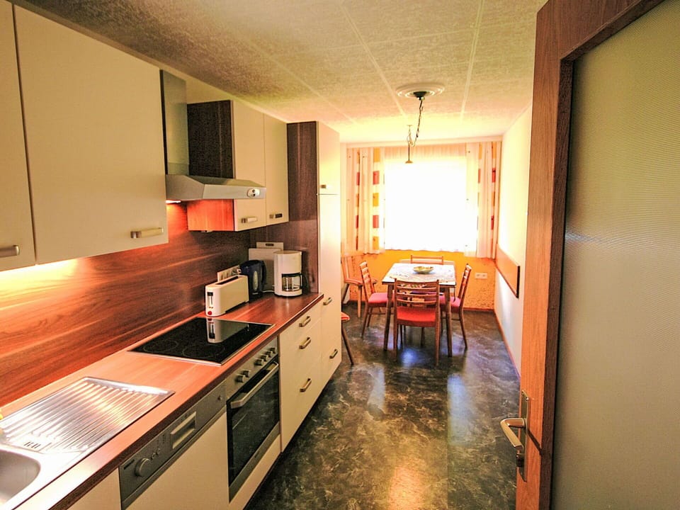 Interior Design, Wood, Flooring, Kitchen, Countertop, Ceiling, Furniture, Room, Floor, Apartment