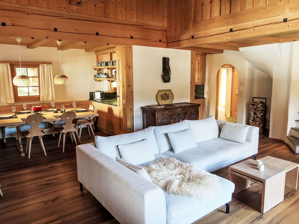 Furniture, Interior Design, Flooring, Wood, Floor, Table, Wood Flooring, Chair, Couch, Ceiling