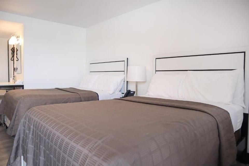 Relax together with roomy beds and a calm, airy feel.