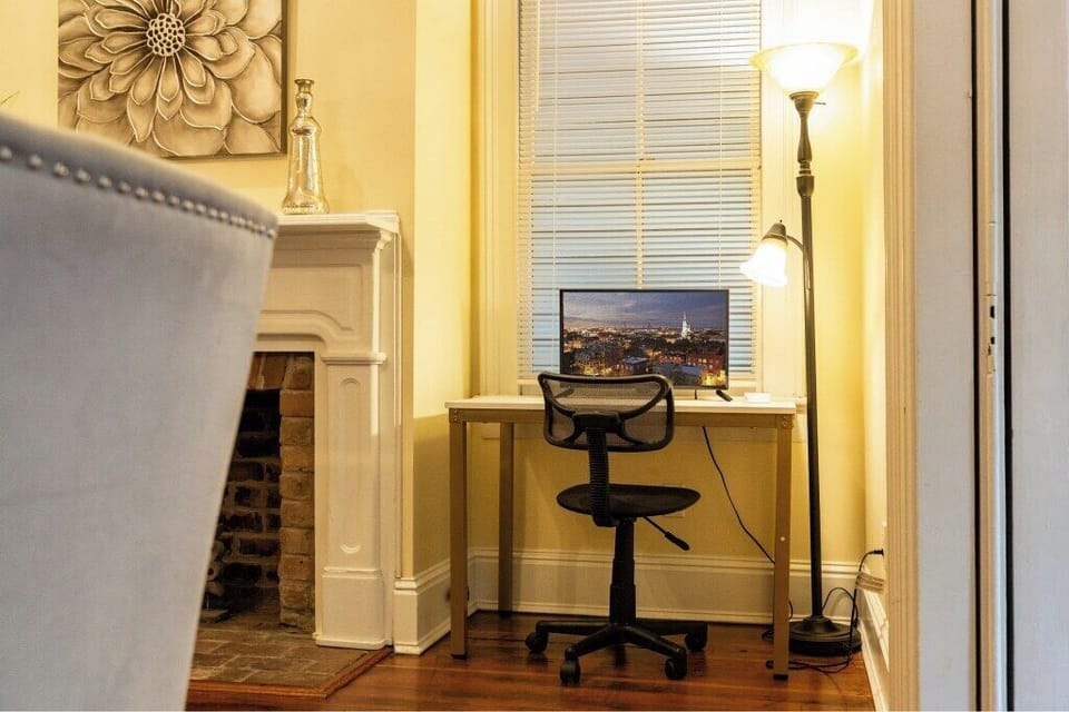 A cozy desk nook in the dining room provides the perfect spot to work or plan your Savannah adventures.