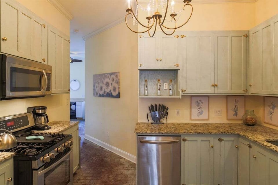 Fully equipped kitchen with generous counter space and a gas stove—perfect for home-cooked meals or local takeout.