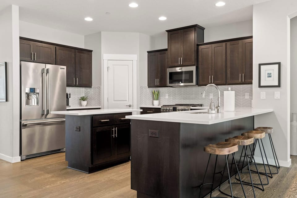 Kitchen island with bar seating, ready for casual breakfasts or evening conversations.