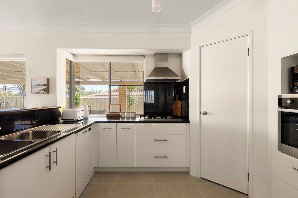 Kitchen with gas stove top and oven. 