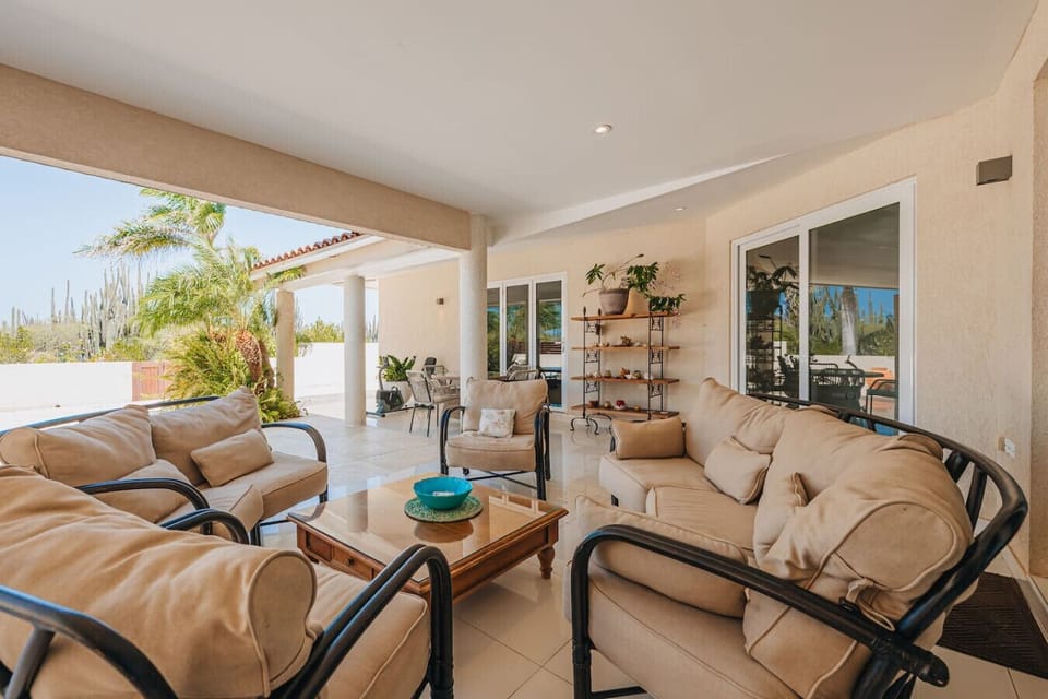 Relax on our spacious patio, perfectly situated by the pool. Enjoy leisurely afternoons and vibrant evenings in this inviting outdoor space designed for comfort and style.