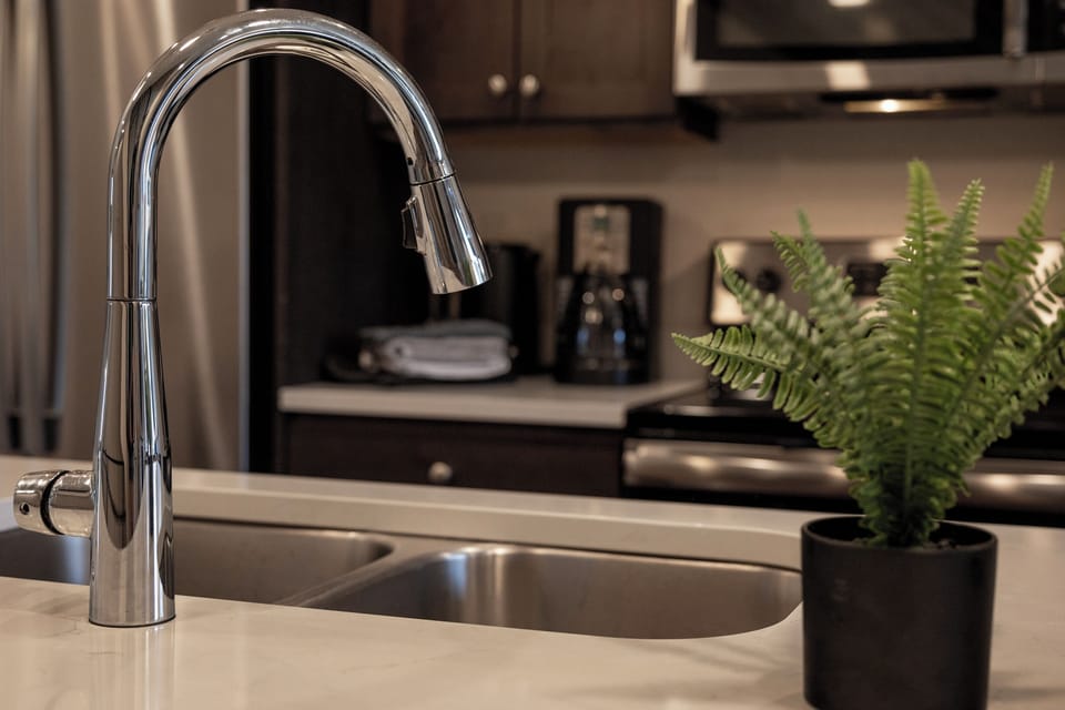 Kitchen - Modern kitchen with stainless steel appliances and everything you need to cook your meals