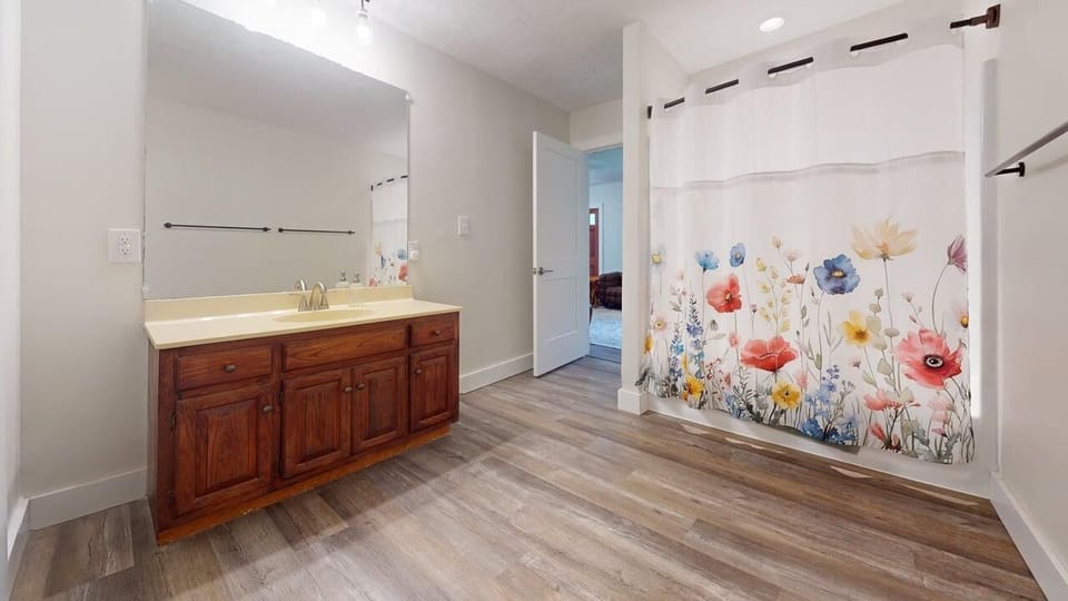 Full bathroom with tub