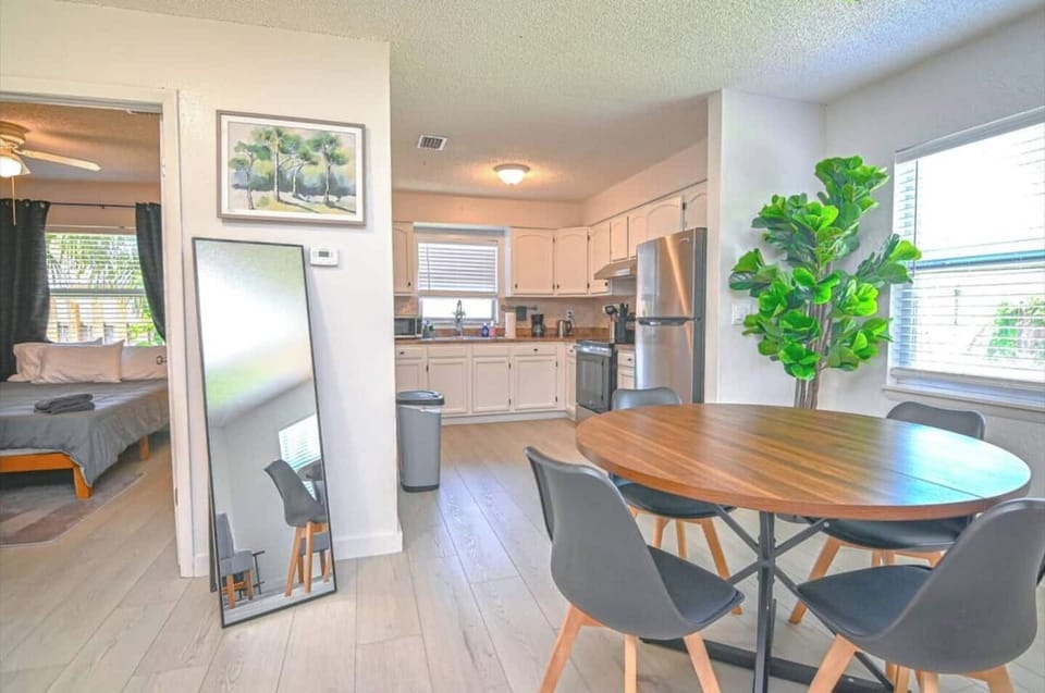 Spacious dining area perfect for meals, virtual meetings, or spreading out your work materials.
