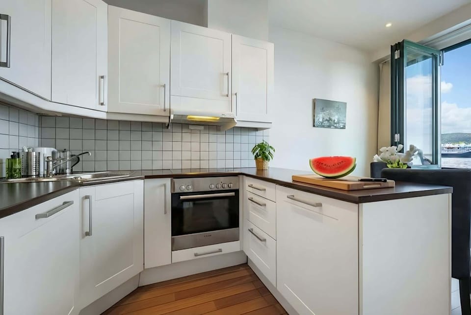 Kitchen with oven and microwave
