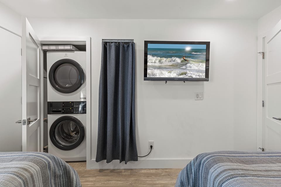 Guest bedroom and washer and dryer