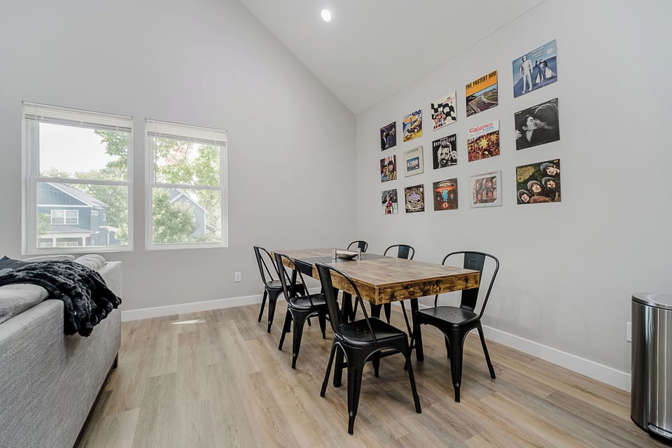 A meal deserves a soundtrack - enjoy our custom wall of timeless vinyl records!