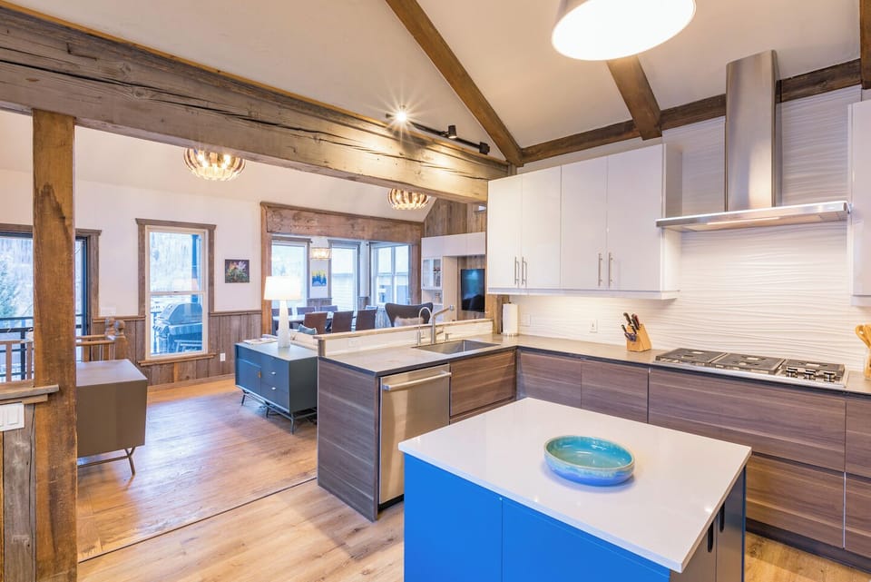 Cathedral kitchen, looking across living room and into dining area