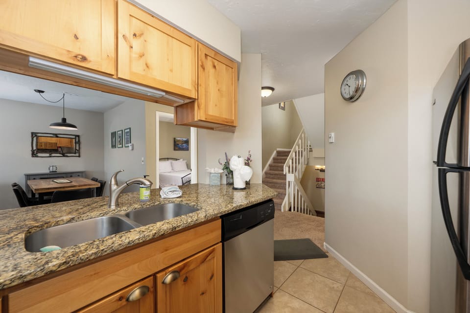 Another view of the kitchen and dining area