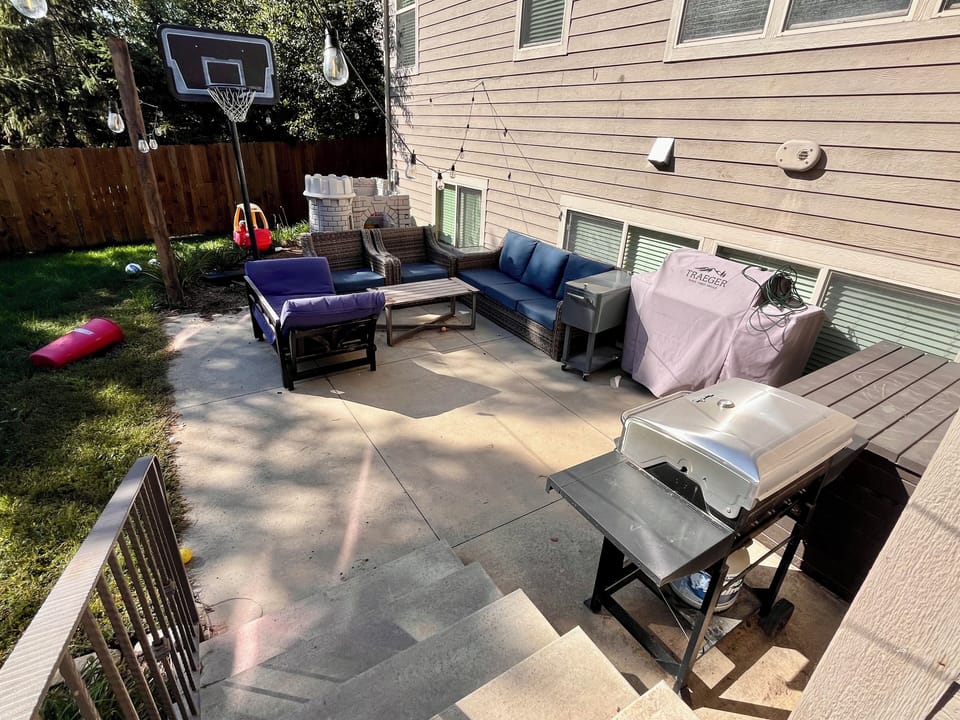 Outdoor patio. With gas grill and family seating.