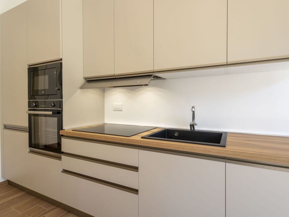 Kitchen, Countertop, Flooring, Wood, Interior Design, Kitchen Appliance, Cabinetry, Floor, Furniture, Home