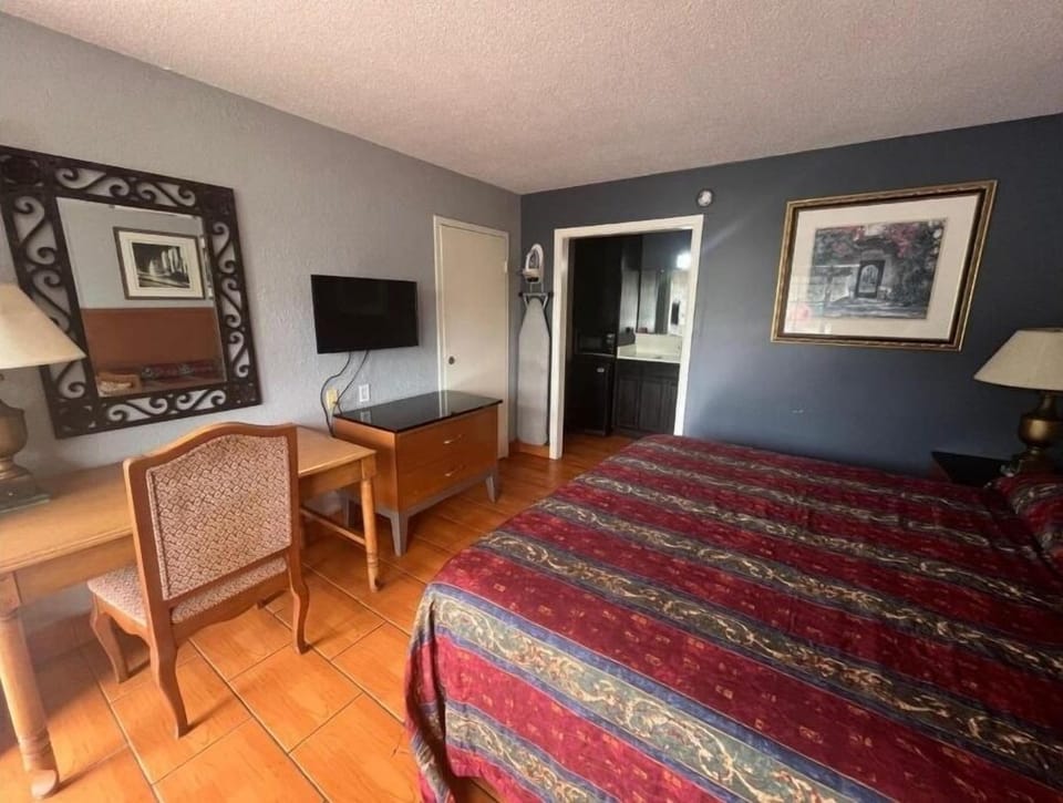 Recharge after exploring with a desk, TV, and restful vibes.