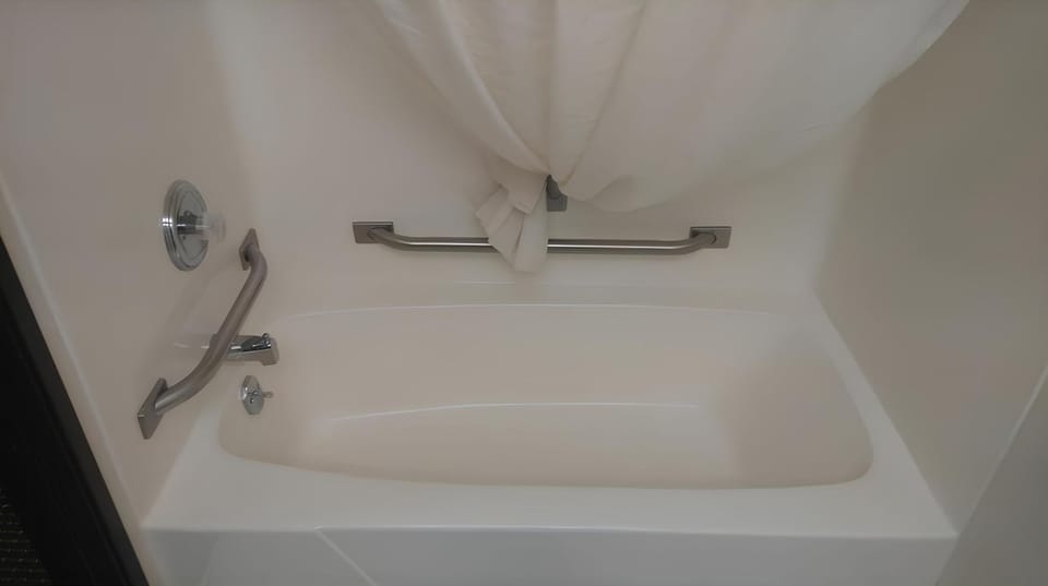 Enjoy added stability with grab bars for safer bathing.