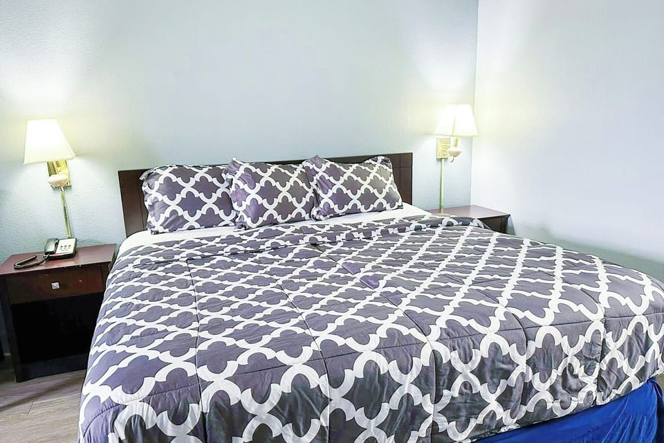 Drift off fast on a plush, neatly made bed.