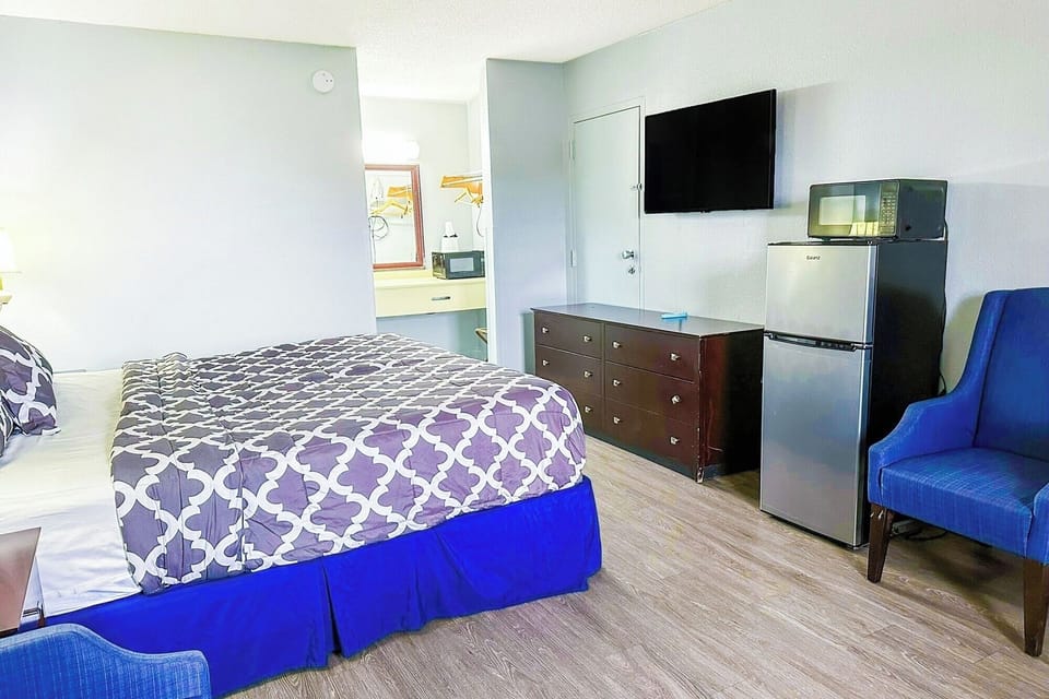 Enjoy quick snacks anytime with microwave and mini fridge.
