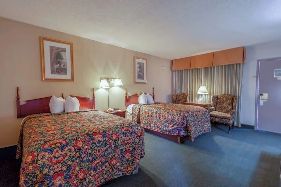 Settle in after arrival with two cozy beds and seating.